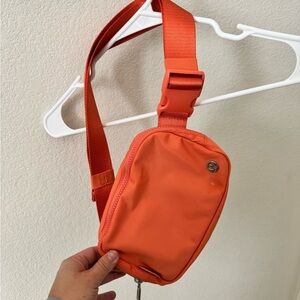 Lululemon Athletica Vibrant Orange Crossbody Bag